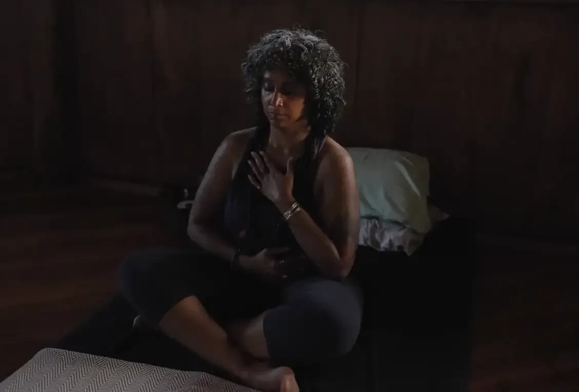 Retreat guests practicing embodied movement and breath awareness